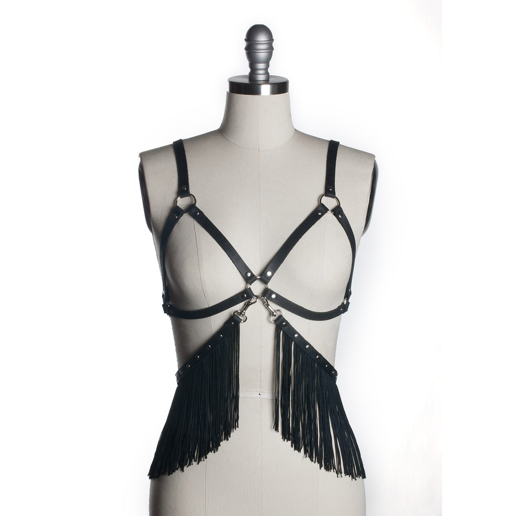 https://www.apatico.net/cdn/shop/products/apatico-fringe-cage-bra-harness-black-leather-pvc-burlesque-pinup-vintage-1920s-boudoir-gothic-seattle-fashion-design-crop_1024x1024.jpg?v=1523141636