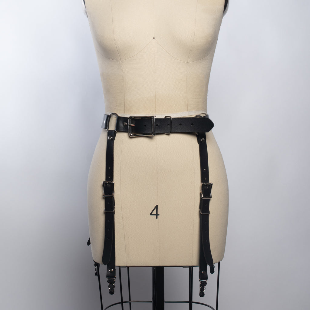 https://www.apatico.net/cdn/shop/products/apatico-garter-belt-black-vegan-leather-clear-pvc-waist-harness-buckle-straps-gothic-fetish-fashion_1024x1024.jpg?v=1542871554